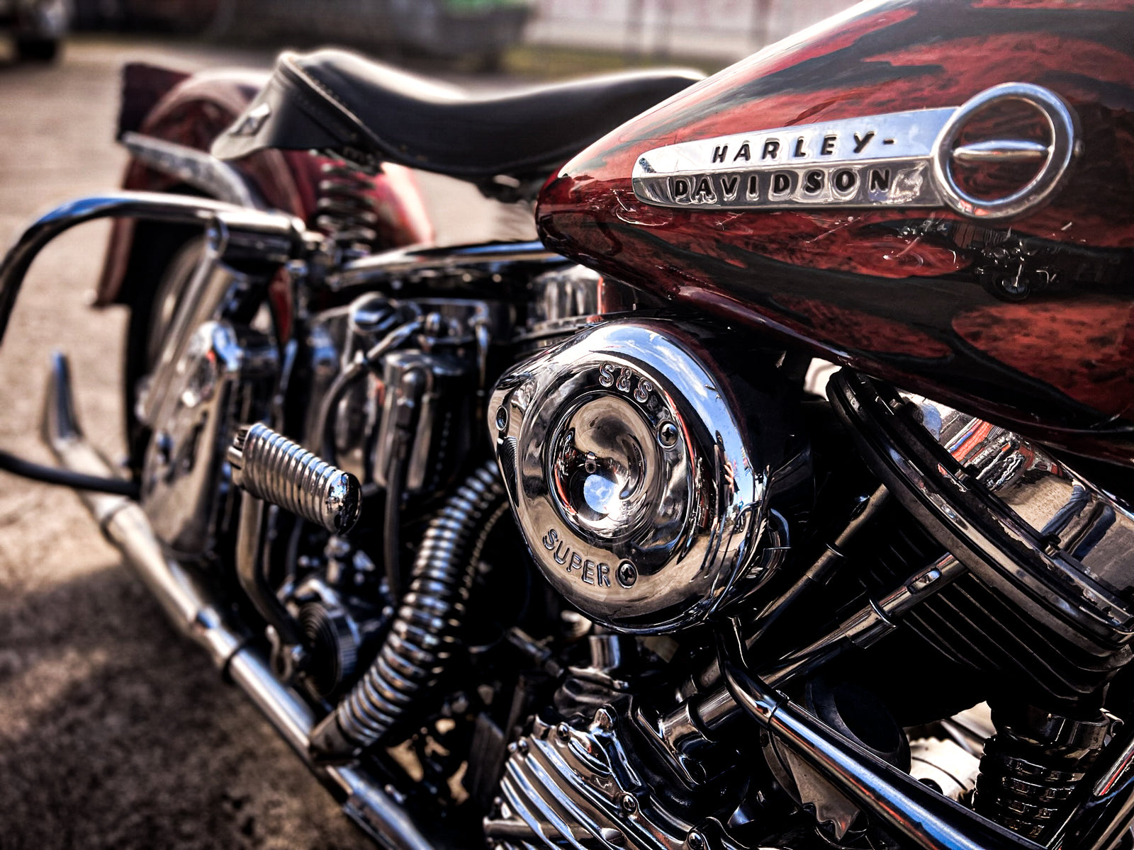 Candy-red custom Harley with S&S Super E carburetor and chrome engine